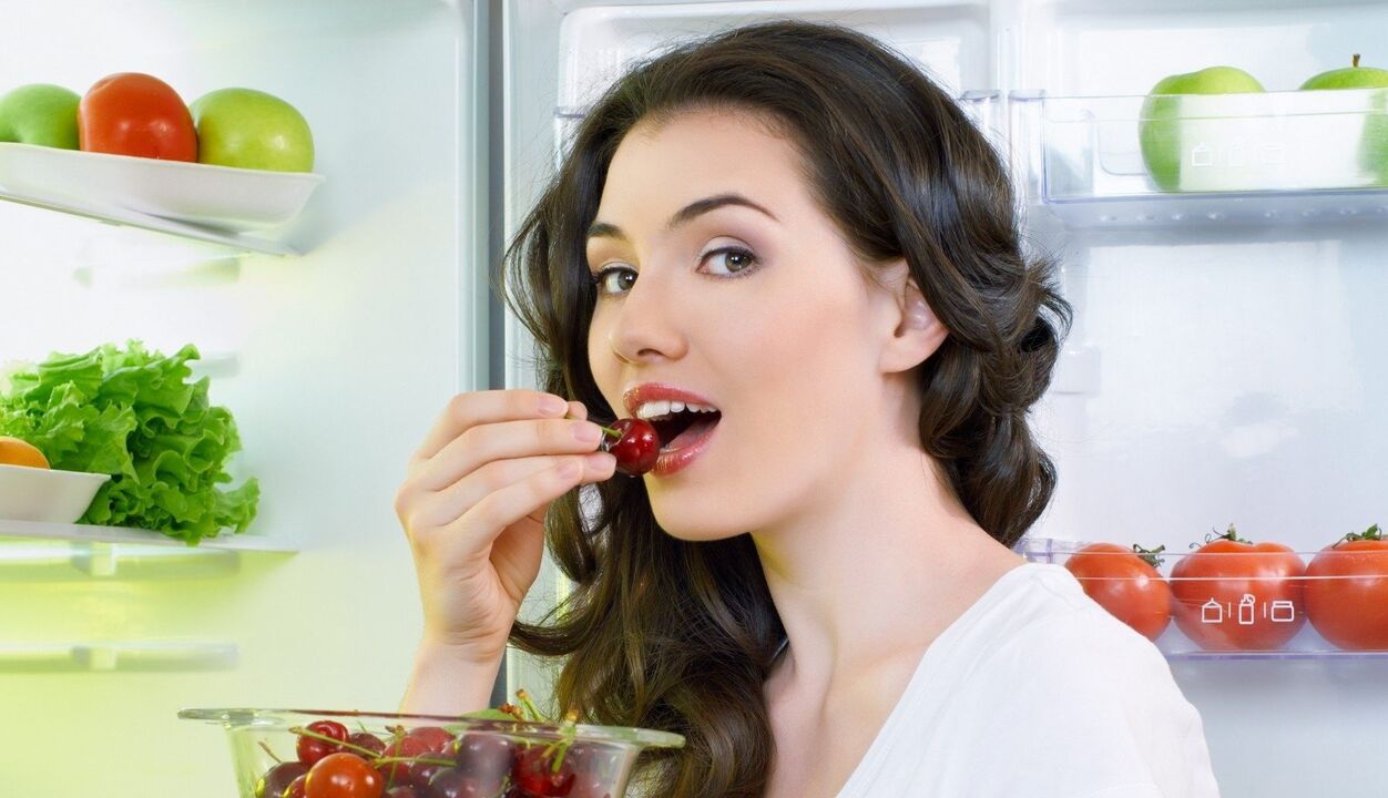 girl eats fruit to increase breast